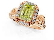 Halo Engagement Ring Setting for Fancy Yellow Emerald Cut Center with Open Scroll Shoulders and Prong Head in Rose Gold