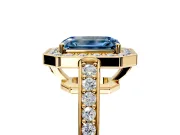 Bezel-Framed Halo Engagement Ring Setting for Fancy Blue Emerald Cut Center with Pave Band and Prong Head in Yellow Gold
