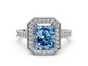Halo Engagement Ring Setting for Fancy Blue Radiant Cut Center with Milgrain Pave Band and Bezel Head in White Gold