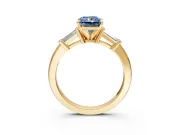 3 Stone Engagement Ring Setting for Fancy Blue Radiant Cut Center with Channel Baguette Accents and Prong Head in Yellow Gold