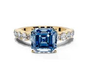 Shared-Prong Engagement Ring Setting for Fancy Blue Asscher Cut Center with Graduated Accents and Prong Head in Yellow Gold