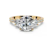 3 Stone Engagement Ring Setting for Round Cut Center with Round Cut Side Accents and Prong Head in Yellow Gold