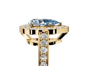 Bezel-Framed Halo Engagement Ring Setting for Fancy Blue Pear-Shaped Center with Pave Band and Prong Head in Yellow Gold