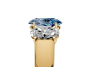 3 Stone Engagement Ring Setting for Fancy Blue Oval Center with Raised Basket Heads and Prong Head in Yellow Gold