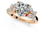 Floral Engagement Ring Setting for Heart-Shaped Center with Marquise Cluster Shoulders and Prong Head in Rose Gold