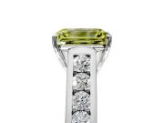 Solitaire Engagement Ring Setting for Fancy Yellow Emerald Cut Center with Cathedral Channel Band and Prong Head in Platinum