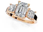 3 Stone Engagement Ring Setting for Emerald Cut Center with Matching Side Accents and Prong Head in Rose Gold