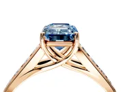 Solitaire Engagement Ring Setting for Fancy Blue Emerald Cut Center with Cathedral Channel Band and Prong Head in Rose Gold