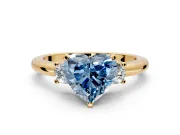 3 Stone Engagement Ring Setting for Fancy Blue Heart-Shaped Center with Wide Plain Band and Prong Head in Yellow Gold