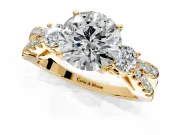 3 Stone Engagement Ring Setting for Round Cut Center with Pave Split Shank and Prong Head in Yellow Gold