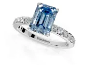 Solitaire Engagement Ring Setting for Fancy Blue Emerald Cut Center with Round Cut Pave Band and Prong Head in White Gold