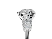 3 Stone Engagement Ring Setting for Heart-Shaped Center with Large Pear-Shaped Accents and Prong Head in Platinum