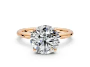 Low-Set Solitaire Engagement Ring Setting for Round Cut Center with Thin Plain Band and Prong Head in Rose Gold