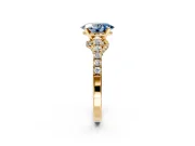 Solitaire Engagement Ring Setting for Fancy Blue Oval Center with Crossover Accents and Prong Head in Yellow Gold