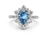 Floral Halo Engagement Ring Setting for Fancy Blue Pear-Shaped Center with Pave Accents and Prong Head in Platinum