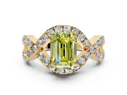 Halo Engagement Ring Setting for Fancy Yellow Emerald Cut Center with Pave Infinity Twist Band and Prong Head in Yellow Gold