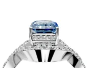 Halo Engagement Ring Setting for Fancy Blue Radiant Cut Center with Pave Infinity Twist Band and Prong Head in Platinum