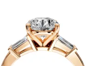 3 Stone Engagement Ring Setting for Round Cut Center with Channel Baguette Accents and Prong Head in Rose Gold