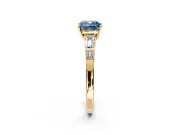 Bar-Set Engagement Ring Setting for Fancy Blue Cushion Cut Center with Tapered Baguette Accents and Prong Head in Yellow Gold