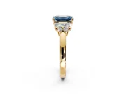 Solitaire Engagement Ring Setting for Fancy Blue Emerald Cut Center with Marquise Flower Shoulders and Prong Head in Yellow Gold