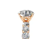 Shared-Prong Engagement Ring Setting for Round Cut Center with Graduated Accents and Prong Head in Rose Gold