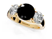 3 Stone Engagement Ring Setting for Fancy Black Round Cut Center with Raised Basket Heads and Prong Head in Yellow Gold