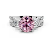 3 Stone Engagement Ring Setting for Fancy Pink Round Cut Center with Pave Twist Band and Prong Head in Platinum