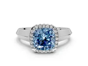 Halo Engagement Ring Setting for Fancy Blue Cushion Cut Center with Knife Ridge Cathedral Band and Prong Head in Platinum