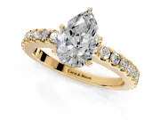 Solitaire Engagement Ring Setting for Pear-Shaped Center with Single Row Accent Band and Prong Head in Yellow Gold