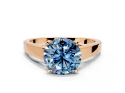 Solitaire Engagement Ring Setting for Fancy Blue Round Cut Center with Tapered Split Shoulders and Prong Head in Rose Gold