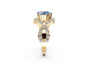 Halo Engagement Ring Setting for Fancy Blue Pear-Shaped Center with Pave Infinity Twist Band and Prong Head in Yellow Gold