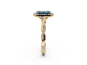 Halo Engagement Ring Setting for Fancy Blue Emerald Cut Center with Twist Band and Prong Head in Yellow Gold