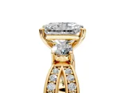 3 Stone Engagement Ring Setting for Radiant Cut Center with Pave Twist Band and Prong Head in Yellow Gold
