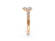 Cluster Engagement Ring Setting for Pear-Shaped Center with Round Cut Accent Band and Prong Head in Rose Gold