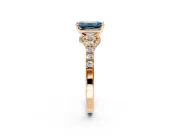 Solitaire Engagement Ring Setting for Fancy Blue Emerald Cut Center with Crossover Accents and Prong Head in Rose Gold