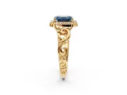 Halo Engagement Ring Setting for Fancy Blue Emerald Cut Center with Open Scroll Shoulders and Prong Head in Yellow Gold