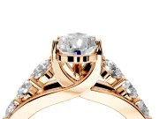 Solitaire Engagement Ring Setting for Pear-Shaped Center with Graduated Shared Prongs and Prong Head in Rose Gold