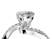 Solitaire Engagement Ring Setting for Heart-Shaped Center with Pave Bypass Swirl Band and Prong Head in Platinum