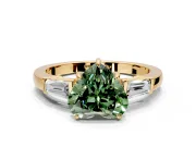 3 Stone Engagement Ring Setting for Fancy Green Heart-Shaped Center with Baguette Accents and Prong Head in Yellow Gold