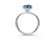 Low-Set Solitaire Engagement Ring Setting for Fancy Blue Round Cut Center with Thin Plain Band and Prong Head in Platinum