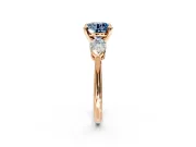 3 Stone Engagement Ring Setting for Fancy Blue Round Cut Center with Large Pear-Shaped Accents and Prong Head in Rose Gold