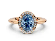 Halo Engagement Ring Setting for Fancy Blue Oval Center with Tapered Plain Band and Prong Head in Rose Gold