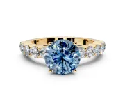 Shared-Prong Engagement Ring Setting for Fancy Blue Round Cut Center with Graduated Accents and Prong Head in Yellow Gold
