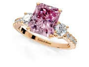 3 Stone Engagement Ring Setting for Fancy Pink Radiant Cut Center with Round Cut Side Accents and Prong Head in Rose Gold