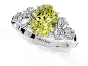 Cluster Engagement Ring Setting for Fancy Yellow Oval Center with Round Cut Accent Frame and Prong Head in Platinum