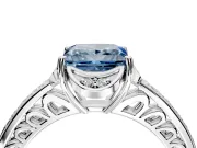 Floral Engagement Ring Setting for Fancy Blue Princess Cut Center with Four Accent Clusters and Prong Head in Platinum