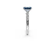 Cluster Engagement Ring Setting for Fancy Blue Emerald Cut Center with Round Cut Accent Band and Prong Head in Sterling Silver