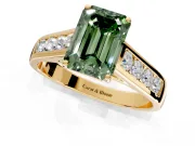 Solitaire Engagement Ring Setting for Fancy Green Emerald Cut Center with Cathedral Channel Band and Prong Head in Yellow Gold