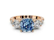 3 Stone Engagement Ring Setting for Fancy Blue Cushion Cut Center with Crossover Basket, Pave Band and Prong Head in Rose Gold