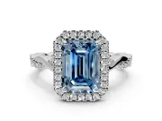 Halo Engagement Ring Setting for Fancy Blue Emerald Cut Center with Twist Band and Prong Head in Platinum